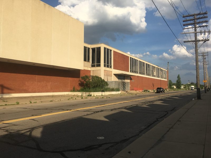 Present-day street-level view of the long engineering building elevation along Scotten Street
